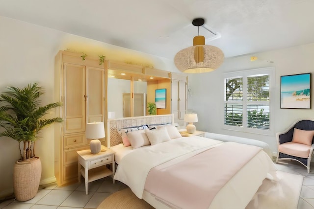 bedroom with light tile patterned flooring