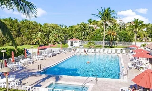 view of pool featuring a patio