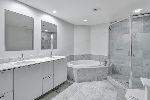 full bathroom with tile floors, shower with separate bathtub, toilet, and dual bowl vanity