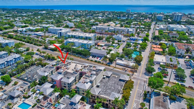 birds eye view of property featuring a water view