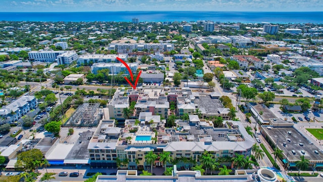 birds eye view of property featuring a water view