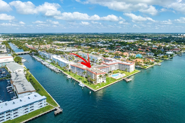 birds eye view of property featuring a water view