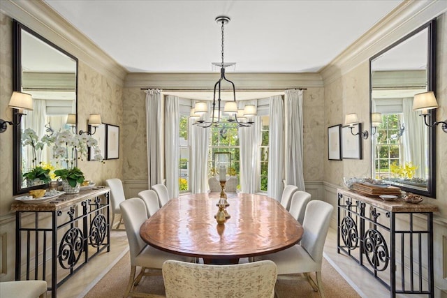 carpeted dining area with a notable chandelier and crown molding