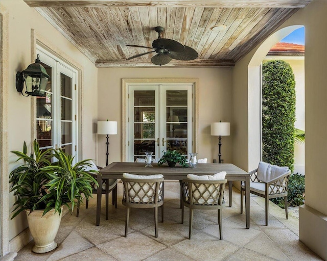 view of patio featuring french doors and ceiling fan