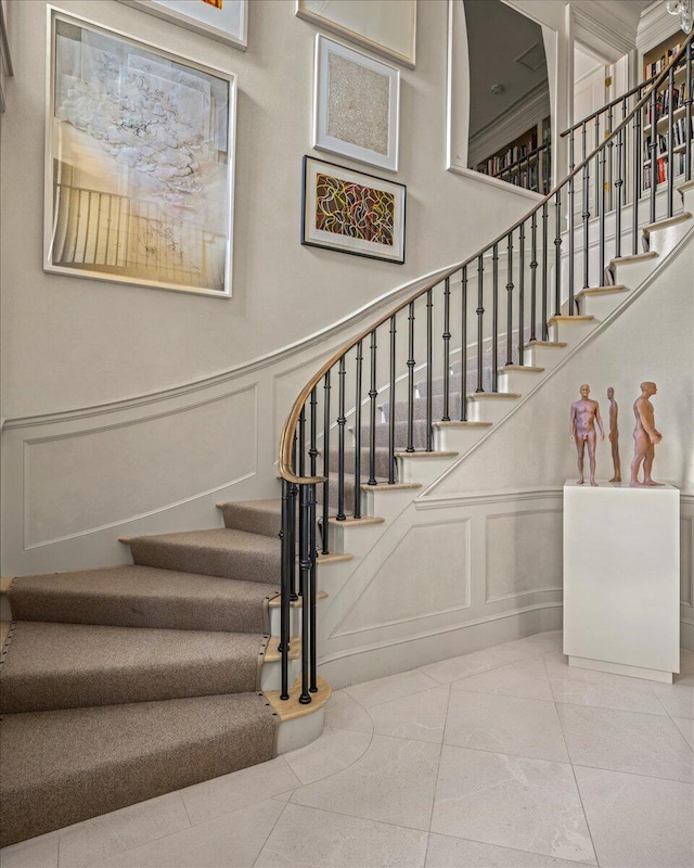 stairs with tile patterned flooring