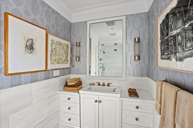 bathroom featuring vanity, walk in shower, and ornamental molding