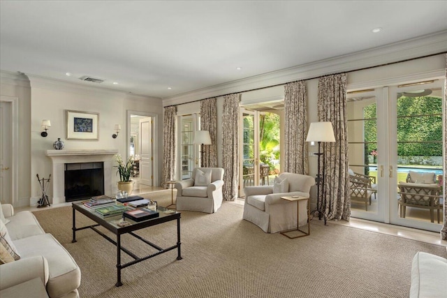 carpeted living room featuring french doors and crown molding