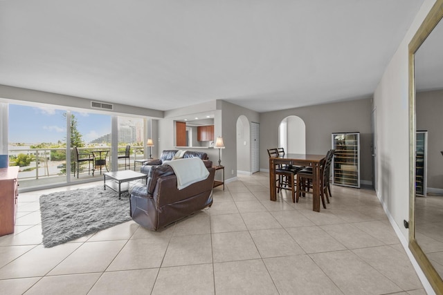 living room featuring light tile patterned floors