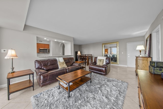 living room featuring light tile patterned flooring