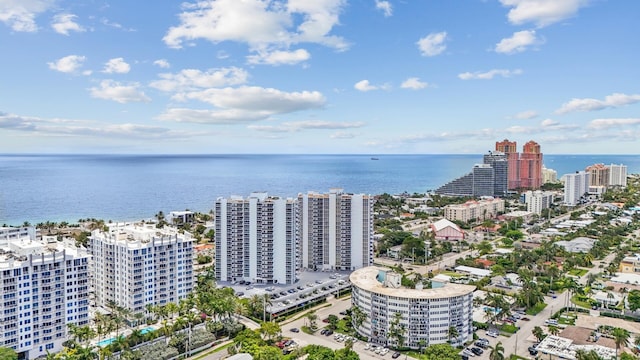 bird's eye view featuring a view of city and a water view