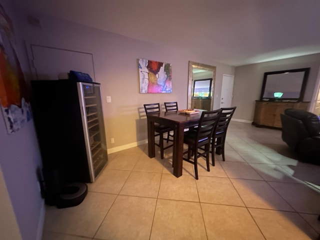 dining area with light tile patterned flooring