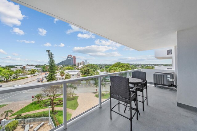 balcony featuring central AC