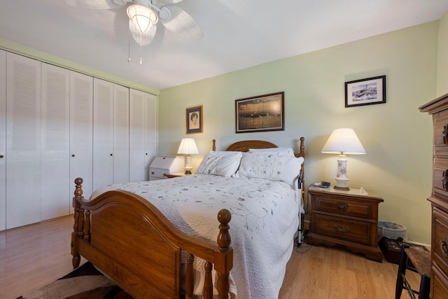 bedroom with light hardwood / wood-style flooring, a closet, and ceiling fan