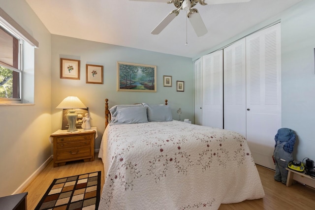 bedroom with a closet, ceiling fan, and light wood-type flooring