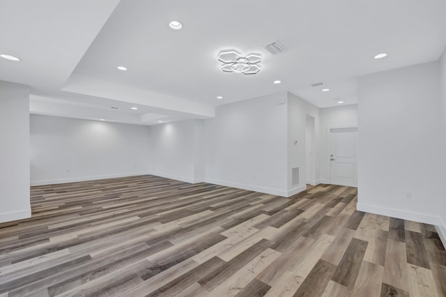 empty room featuring wood-type flooring