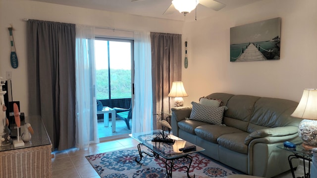 tiled living room with ceiling fan