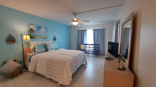 bedroom featuring tile flooring and ceiling fan