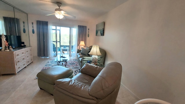 living room with ceiling fan and light tile floors