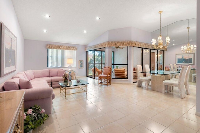 tiled living room with lofted ceiling and an inviting chandelier