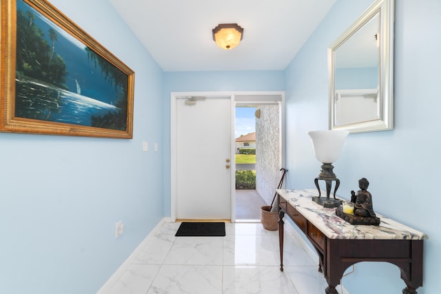 view of tiled foyer entrance