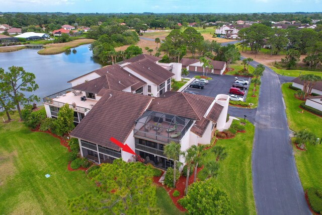 bird's eye view with a water view