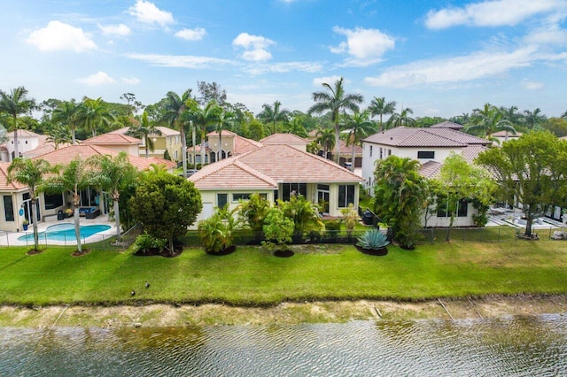 birds eye view of property featuring a water view