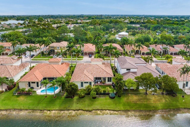 drone / aerial view featuring a water view