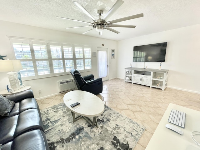 living room featuring a textured ceiling, ceiling fan, and light tile floors