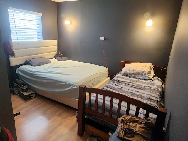 bedroom featuring hardwood / wood-style floors