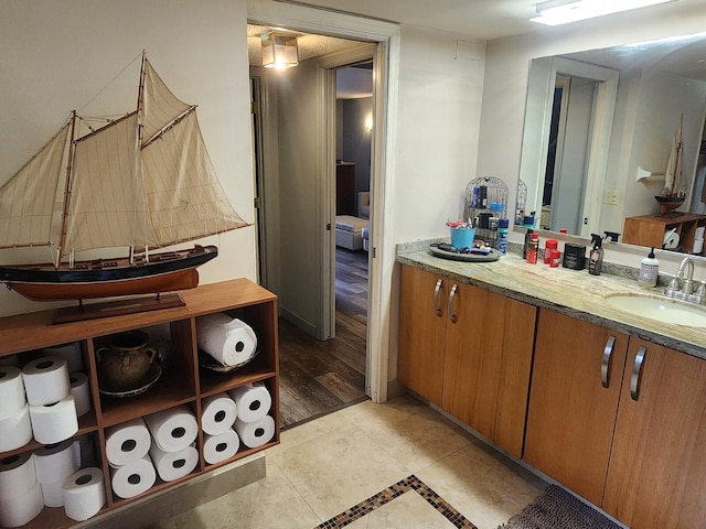 bathroom featuring vanity and hardwood / wood-style floors