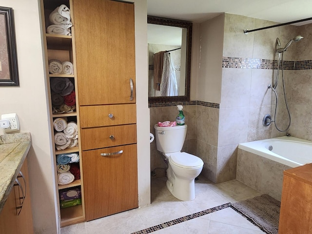 bathroom featuring vanity, toilet, and tile floors