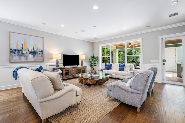 living room featuring ornamental molding and wood-type flooring