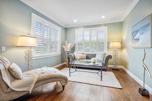 interior space featuring a wealth of natural light, crown molding, and wood-type flooring