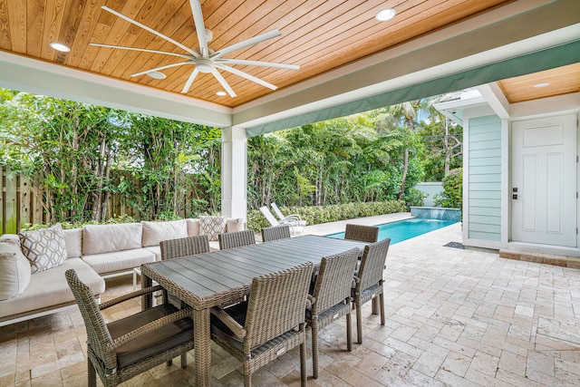 view of patio / terrace featuring area for grilling, ceiling fan, and an outdoor hangout area