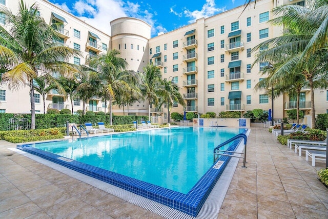 view of pool featuring a patio area