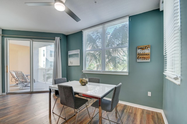 dining area featuring ceiling fan, wood-type flooring, and a wealth of natural light