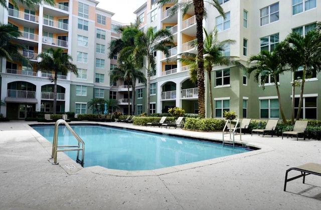 pool featuring a patio area