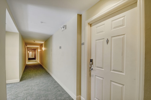 hallway featuring light carpet