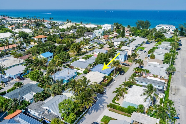 aerial view featuring a residential view and a water view