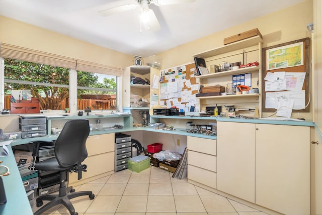 tiled office featuring ceiling fan