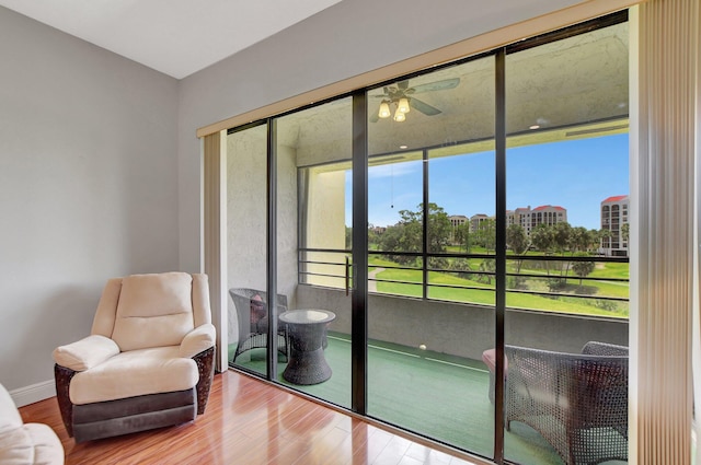 interior space featuring hardwood / wood-style flooring and ceiling fan