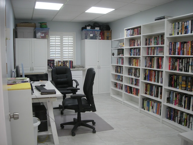 office area with a drop ceiling