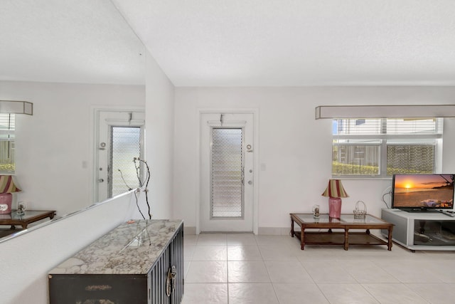 entryway with light tile floors