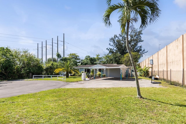 view of yard with a carport