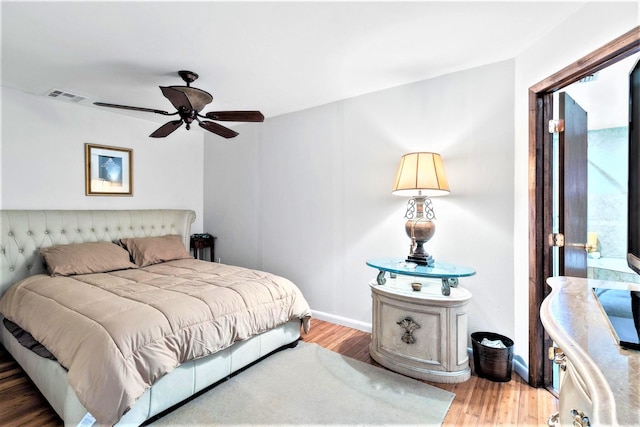 bedroom featuring ceiling fan and hardwood / wood-style floors