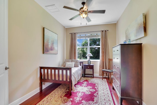 bedroom featuring ceiling fan and hardwood / wood-style flooring