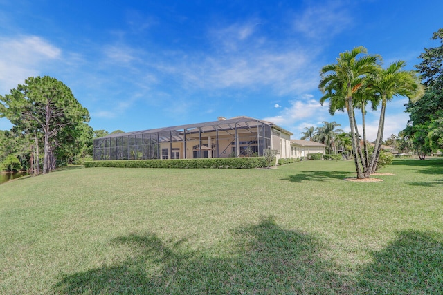 view of yard with a lanai