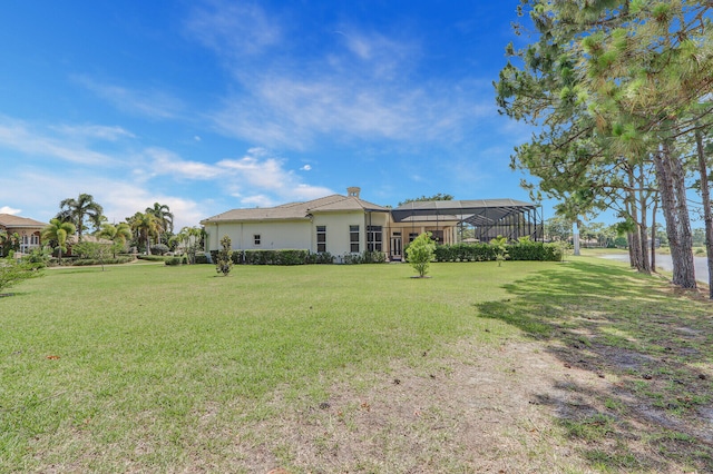 view of yard with a lanai