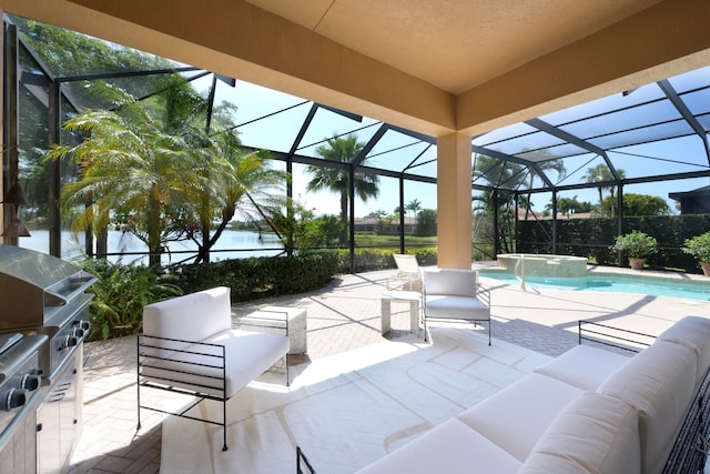 view of patio with an outdoor living space, a lanai, and area for grilling