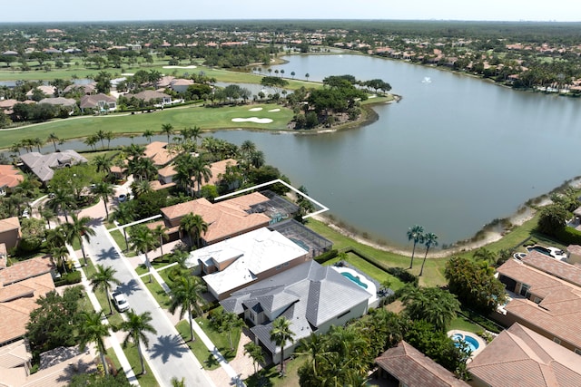 bird's eye view with a water view